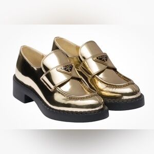 Prada Triangular Logo Metallic Gold Loafers $1400